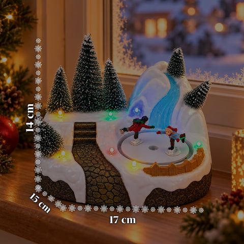 Village de Noël lumineux avec élément rotatif, lumières LED et musique – 3 variantes : sapin, père Noël, enfants – 17x14x15 cm