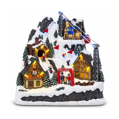 Village de Noël lumineux avec toboggan en mouvement, téléphérique, lumières LED et musique de Noël – 28x19x32 cm